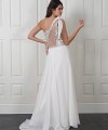Nicole one-shoulder wedding dress with a beaded embroidered lace bodice, illusion back and flowing ivory chiffon skirt