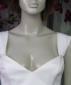 White chiffon detachable bridal straps and sleeves draped off the shoulder