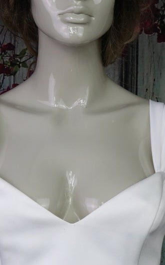 White chiffon detachable bridal straps and sleeves draped off the shoulder