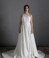 Bride wearing the Lorenza one-shoulder ballgown wedding dress with crystal strap and train, ivory, handmade in London