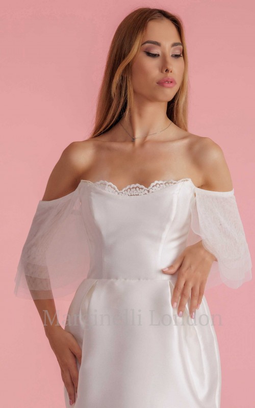 White flutter tulle detachable bridal sleeves and straps with beaded lace at the shoulder