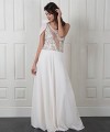 Nicole one-shoulder wedding dress with a beaded embroidered lace bodice, illusion back and flowing ivory chiffon skirt