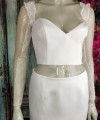 Ivory illusion tulle detachable long bridal sleeves and straps with a lace edge along the arm