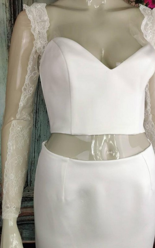 Ivory illusion tulle detachable long bridal sleeves and straps with a lace edge along the arm