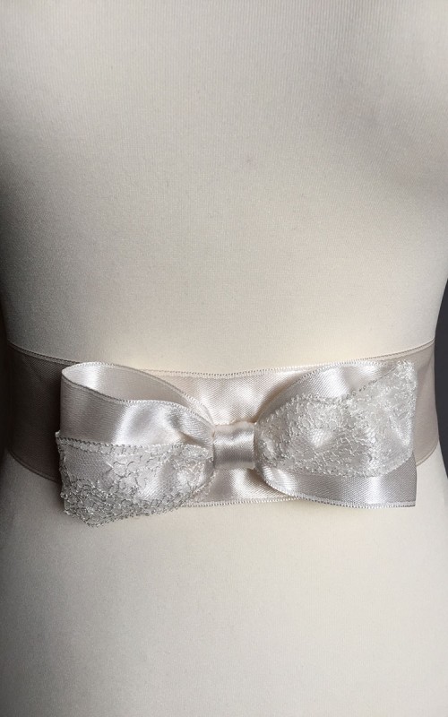 Ivory satin bridal sash belt with a satin and lace bow and silver-edged trim
