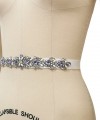 Bridal sash belt with a lavender and clear crystal appliqué that ties at the back in a bow