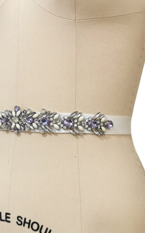 Bridal sash belt with a lavender and clear crystal appliqué that ties at the back in a bow