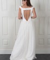 Natalie wedding dress with a satin bateau-neck bodice, open V-back and a long pleated beaded lace skirt