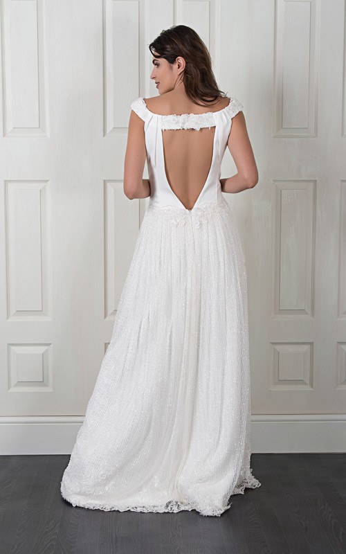 Natalie wedding dress with a satin bateau-neck bodice, open V-back and a long pleated beaded lace skirt