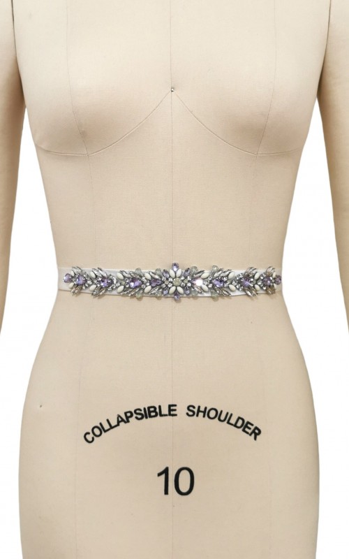 Bridal sash belt with a lavender and clear crystal appliqué that ties at the back in a bow