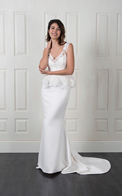 Nadine two-piece wedding dress with a plain satin fishtail gown and a detachable beaded lace top with a peplum