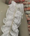White ruffled chiffon detachable bridal straps and sleeves with hand-sewn pearls off the shoulder