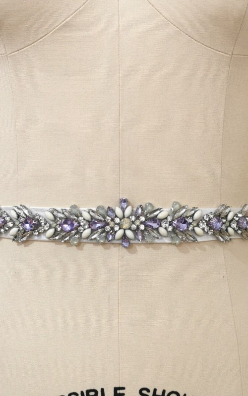 Bridal sash belt with a lavender and clear crystal appliqué that ties at the back in a bow