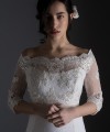 Bianca off-shoulder bridal bolero in ivory beaded lace with 3/4 sleeves and scalloped lace edges