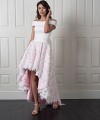 Nancy off-shoulder wedding dress with a smooth satin bodice and a high-low 3D floral lace skirt over blush lining with a bow back