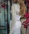 Ivory illusion tulle detachable long bridal sleeves and straps with a lace edge along the arm
