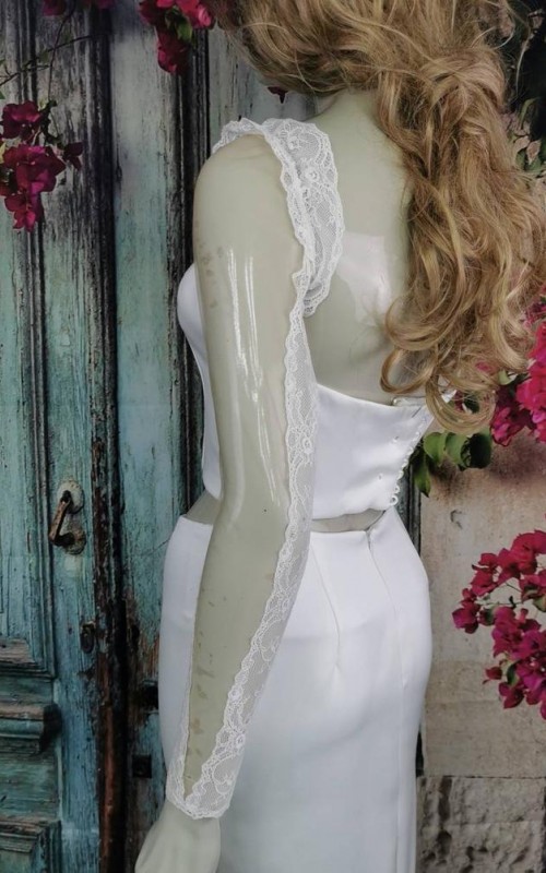 Ivory illusion tulle detachable long bridal sleeves and straps with a lace edge along the arm