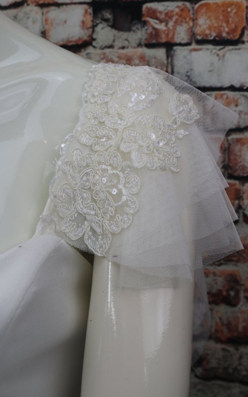 White flutter tulle detachable bridal sleeves and straps with beaded lace at the shoulder