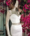 Ivory illusion tulle detachable long bridal sleeves and straps with a lace edge along the arm