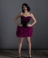 Virginia short black duchess satin cocktail dress with sweetheart neckline and purple plum feathers