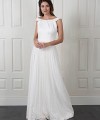 Natalie wedding dress with a satin bateau-neck bodice, open V-back and a long pleated beaded lace skirt