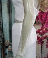 Ivory illusion tulle detachable long bridal sleeves and straps with a lace edge along the arm