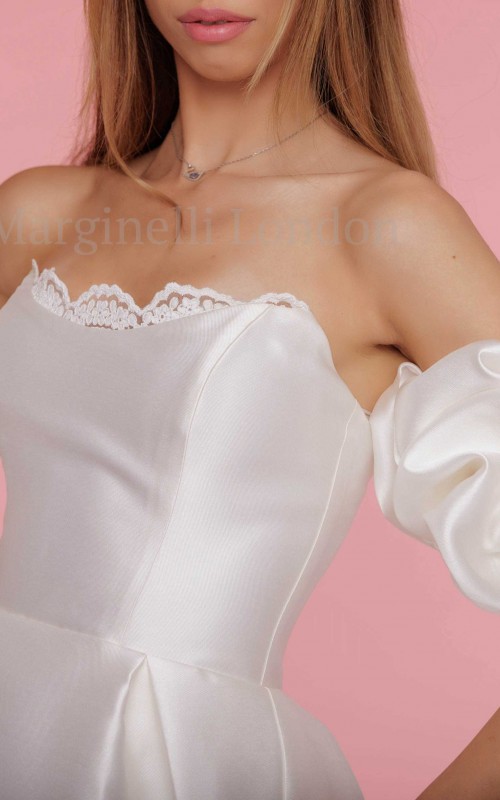 Satin puff detachable bridal sleeves and straps in ivory, worn off the shoulder