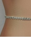Slim ivory bridal belt covered in hand-sewn crystals and pearls with a covered-button back