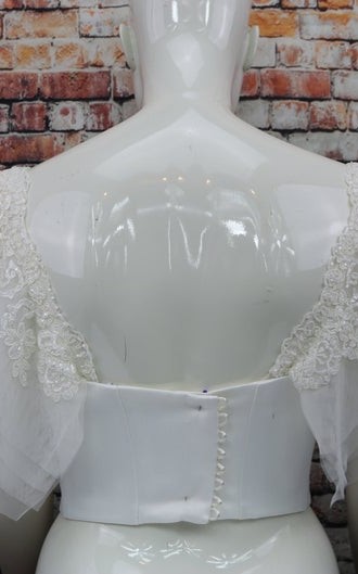 White flutter tulle detachable bridal sleeves and straps with beaded lace at the shoulder