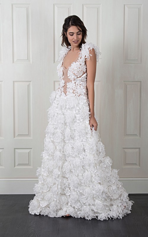 Nadia boho A-line wedding dress covered in 3D fabric flowers with a deep V nude illusion bodice