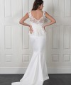 Nadine two-piece wedding dress with a plain satin fishtail gown and a detachable beaded lace top with a peplum