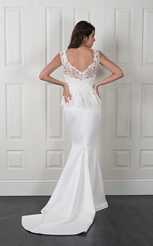Nadine two-piece wedding dress with a plain satin fishtail gown and a detachable beaded lace top with a peplum