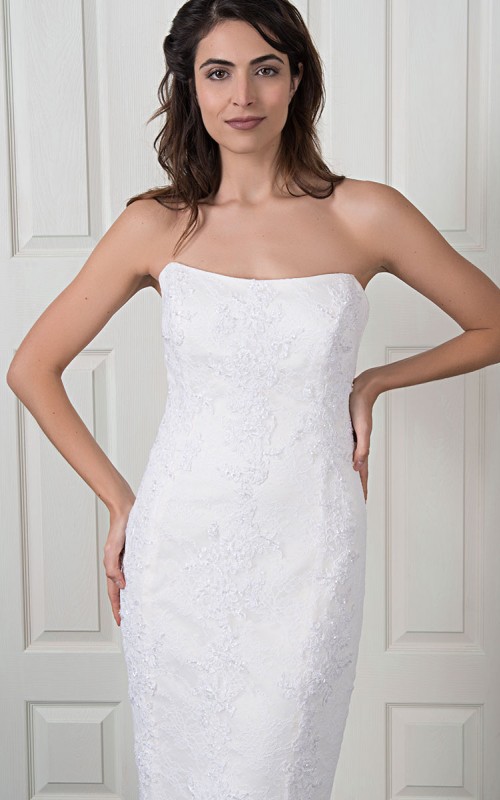 Naomi strapless lace mermaid wedding dress with beaded Italian lace, a V-cut back and a scalloped lace train