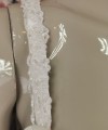 Ivory beaded lace detachable bridal straps and sleeves on satin worn on the shoulder