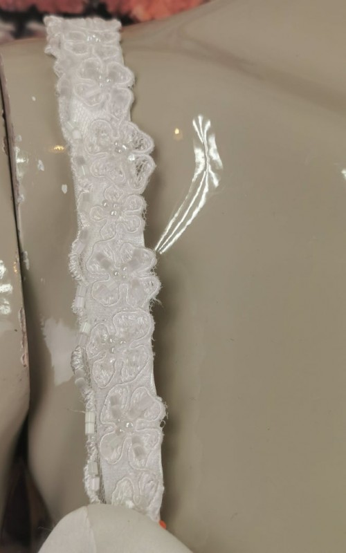 Ivory beaded lace detachable bridal straps and sleeves on satin worn on the shoulder