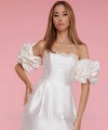 Satin puff detachable bridal sleeves and straps in ivory, worn off the shoulder