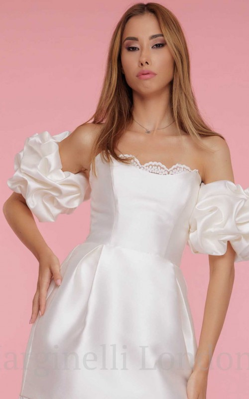 Satin puff detachable bridal sleeves and straps in ivory, worn off the shoulder