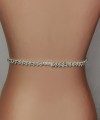 Slim ivory bridal belt covered in hand-sewn crystals and pearls with a covered-button back