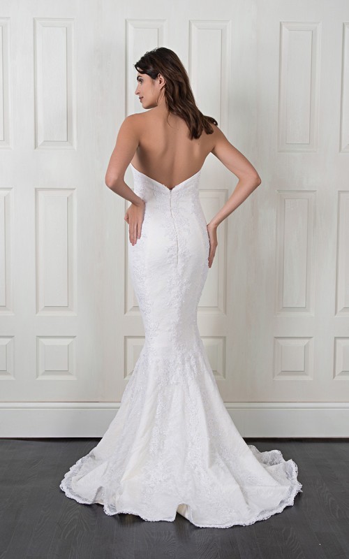 Naomi strapless lace mermaid wedding dress with beaded Italian lace, a V-cut back and a scalloped lace train