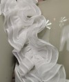 White ruffled chiffon detachable bridal straps and sleeves with hand-sewn pearls off the shoulder