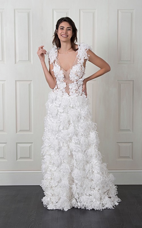 Nadia boho A-line wedding dress covered in 3D fabric flowers with a deep V nude illusion bodice