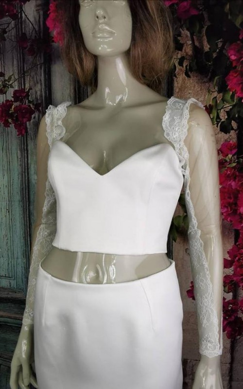 Ivory illusion tulle detachable long bridal sleeves and straps with a lace edge along the arm
