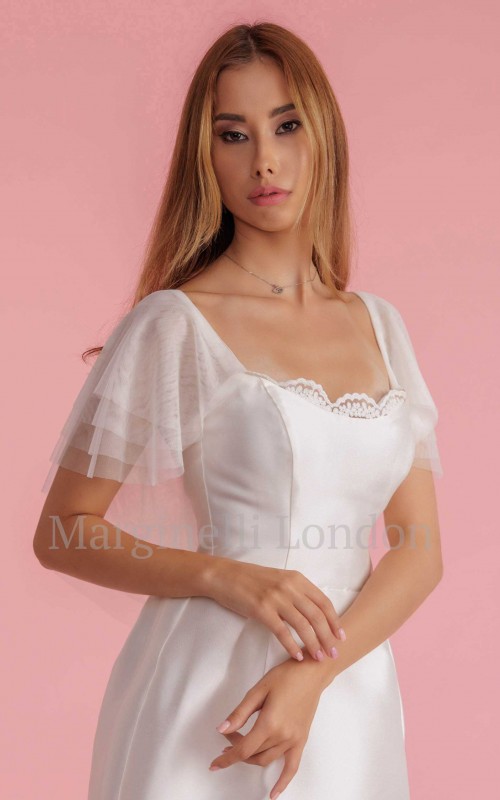 White flutter tulle detachable bridal sleeves and straps with beaded lace at the shoulder