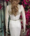 Ivory illusion tulle detachable long bridal sleeves and straps with a lace edge along the arm