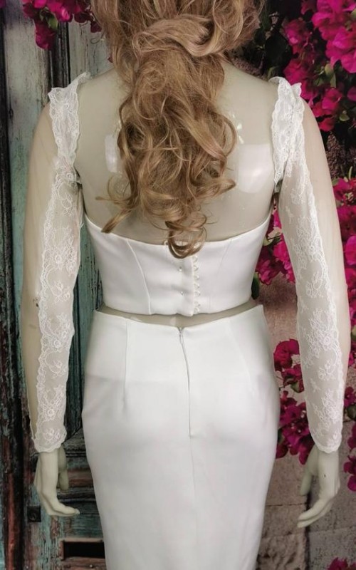 Ivory illusion tulle detachable long bridal sleeves and straps with a lace edge along the arm