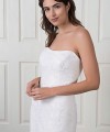Naomi strapless lace mermaid wedding dress with beaded Italian lace, a V-cut back and a scalloped lace train