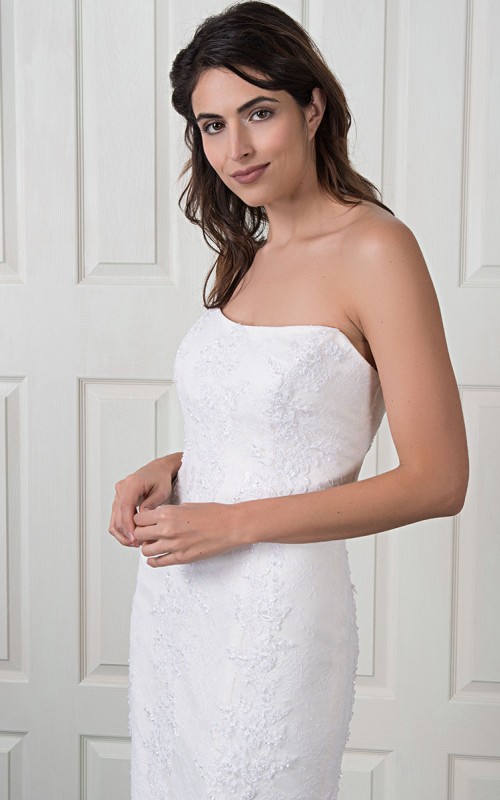 Naomi strapless lace mermaid wedding dress with beaded Italian lace, a V-cut back and a scalloped lace train