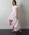 Nancy off-shoulder wedding dress with a smooth satin bodice and a high-low 3D floral lace skirt over blush lining with a bow back